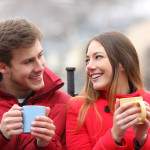 couple in red with coffee